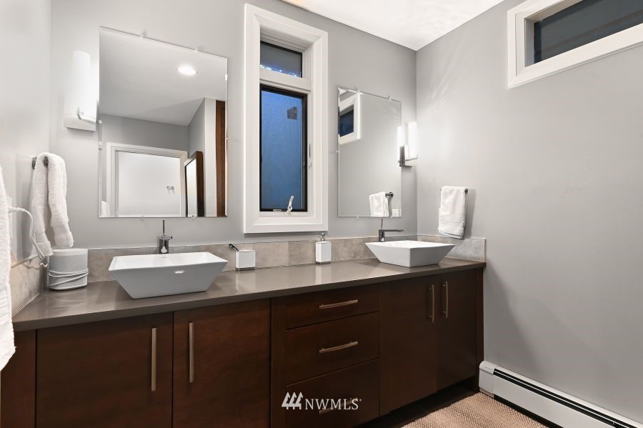 424 Fieldston Road Bellingham, WA 98225 - Photo 23 of 39 a bathroom with a sink and a mirror