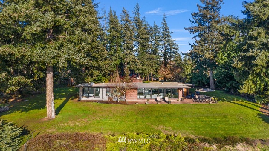 424 Fieldston Road Bellingham, WA 98225 - Photo 34 of 39 a view of house with swimming pool and sitting area