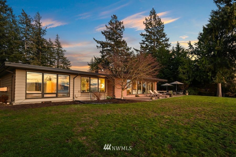 424 Fieldston Road Bellingham, WA 98225 - Photo 35 of 39 a large house with a big yard and large trees