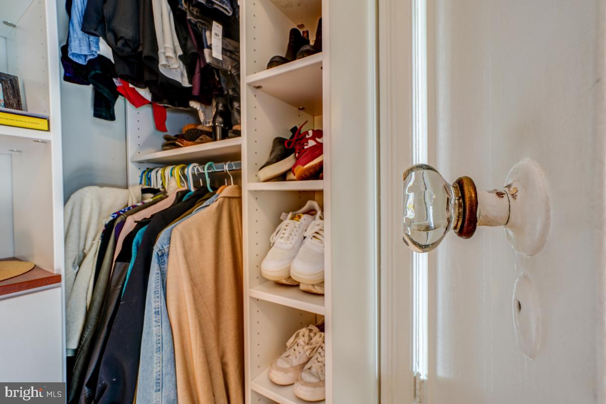 1101 L Street Northwest, Unit 102 Washington, DC 20005 - Photo 33 of 38 Custom closet meets vintage glass knobs