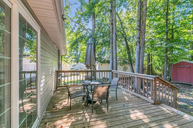 a view of a chairs on the roof deck