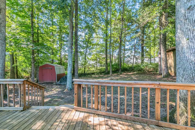 a view of a two chairs in the deck