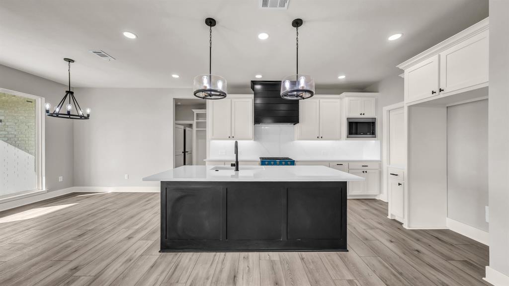 151 County Road 2610 Decatur, TX 76234 - Photo 12 of 38 Whirlpool appliances, white cabinets and a large pantry