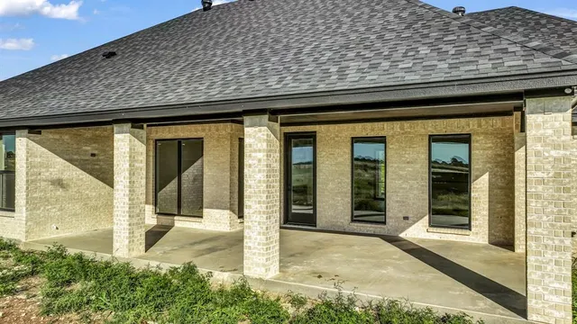 a front view of a house with a porch