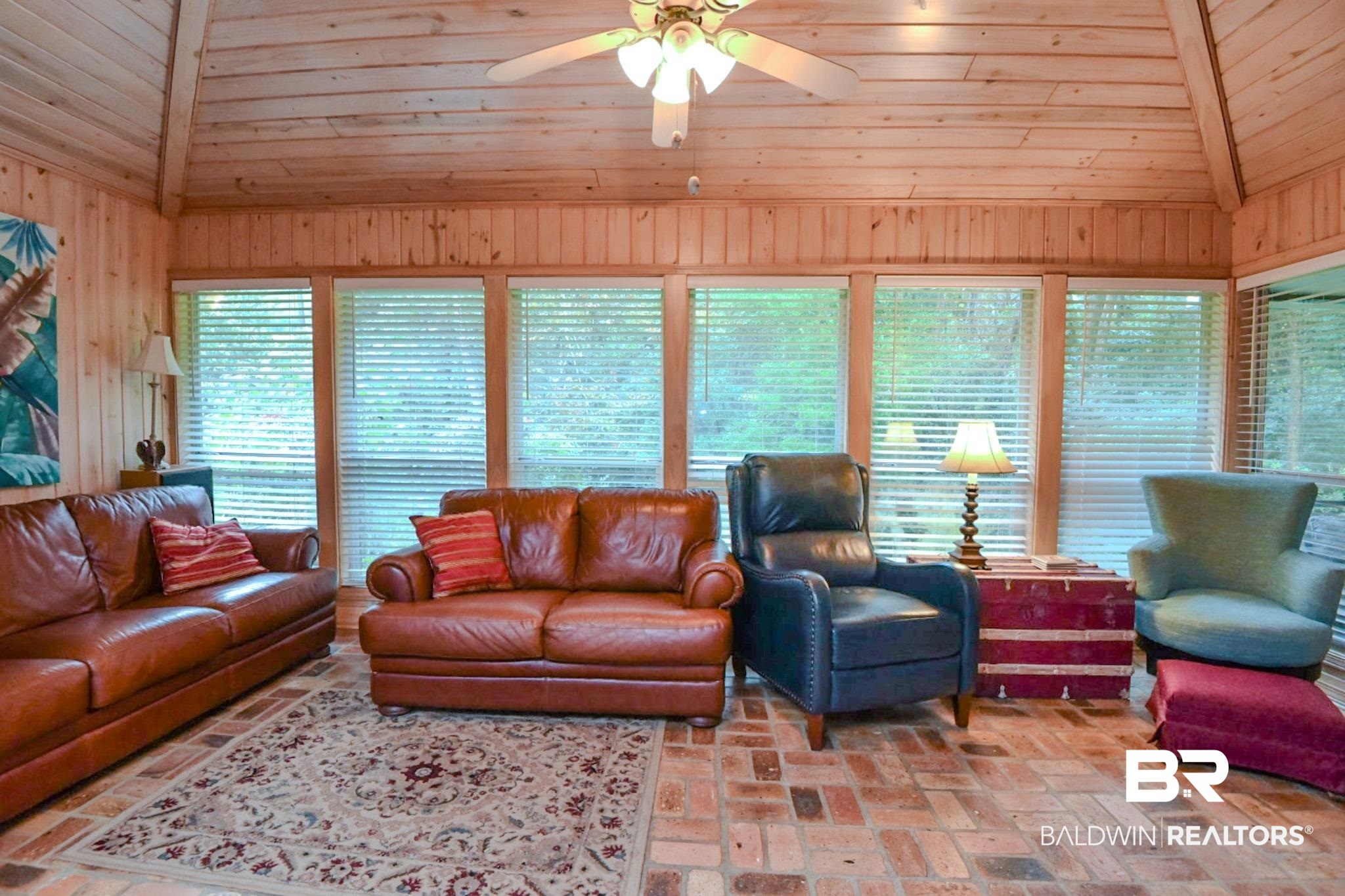 90 Paddock Drive Fairhope, AL 36532 - Photo 12 of 23 Living room with vaulted ceiling, plenty of natural light, brick floors, wood ceiling, and ceiling fan