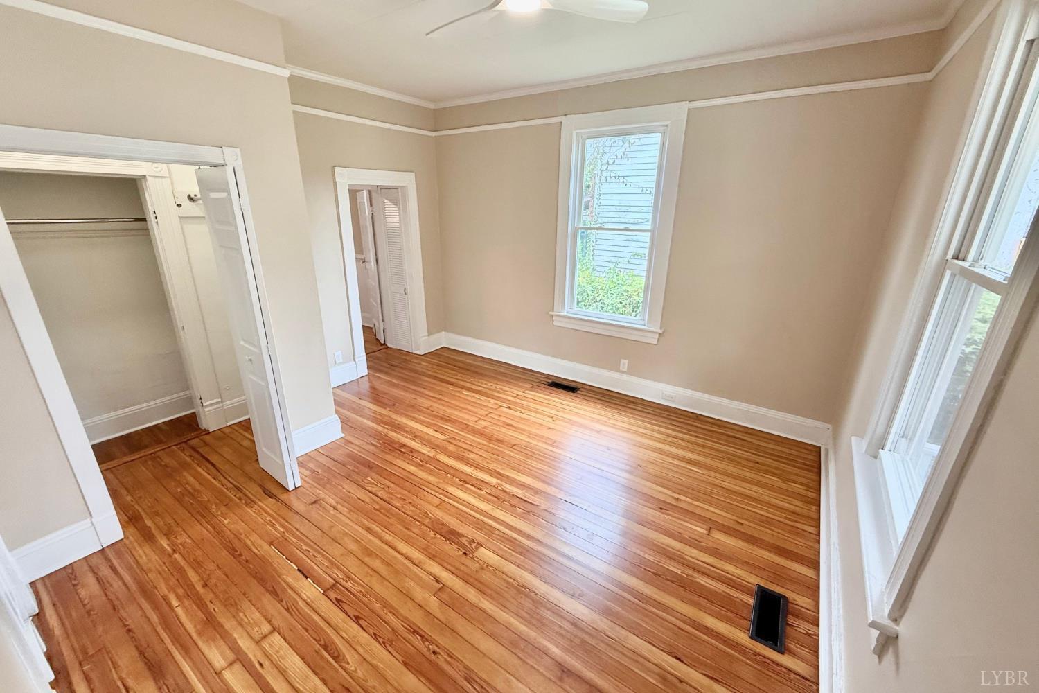 2225 Sabine Street Lynchburg, VA 24501 - Photo 5 of 13 wooden floor in an empty room with a window