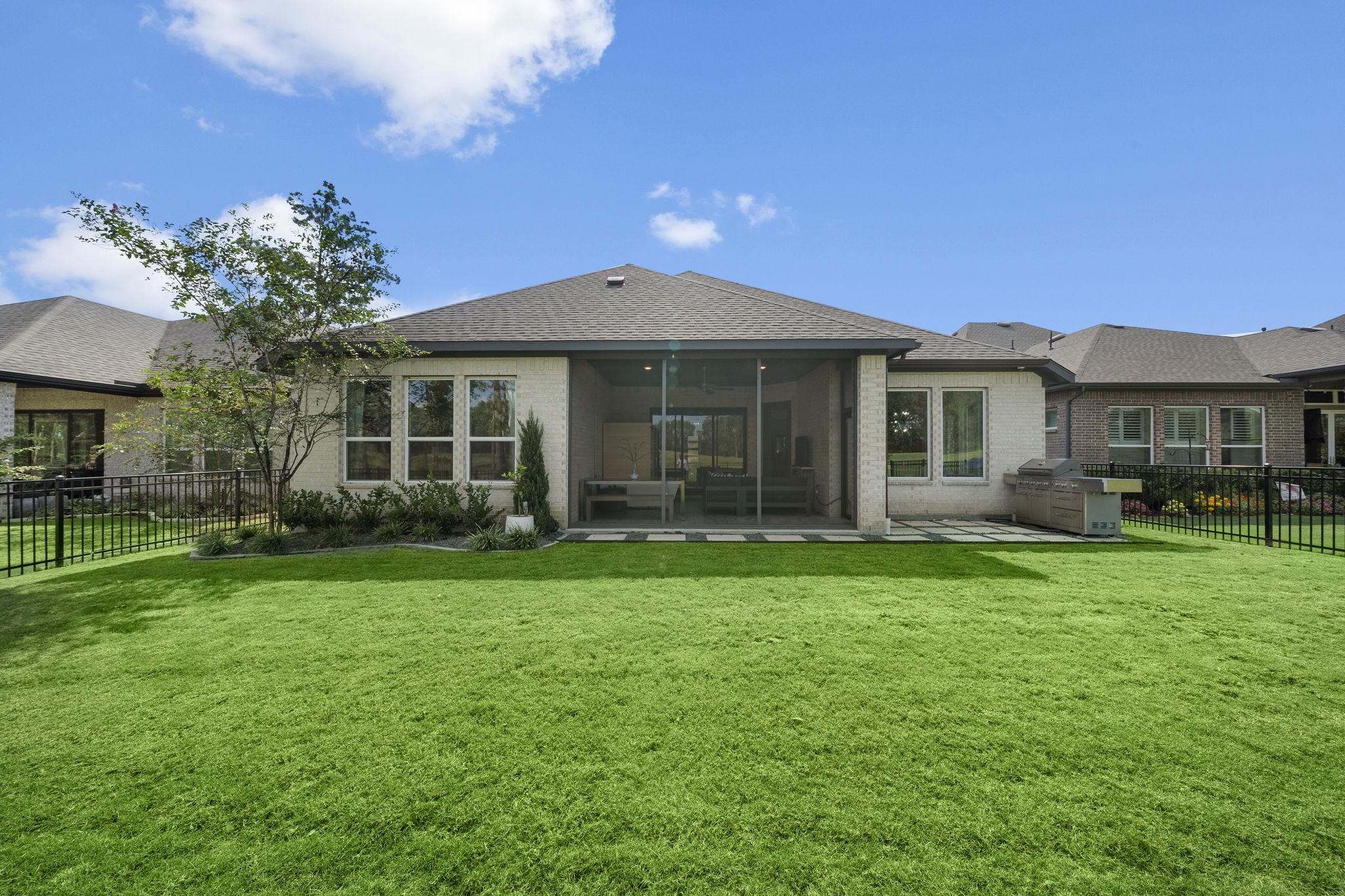 7551 Congress Trl Way Porter, TX 77365 - Photo 30 of 48 a front view of a house with a garden