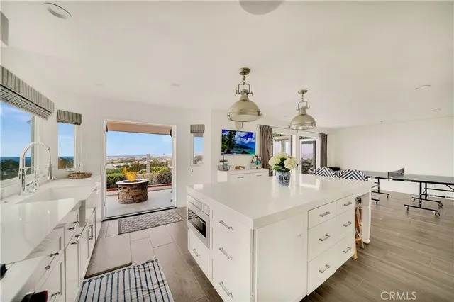 a view of a kitchen with appliances and cabinets