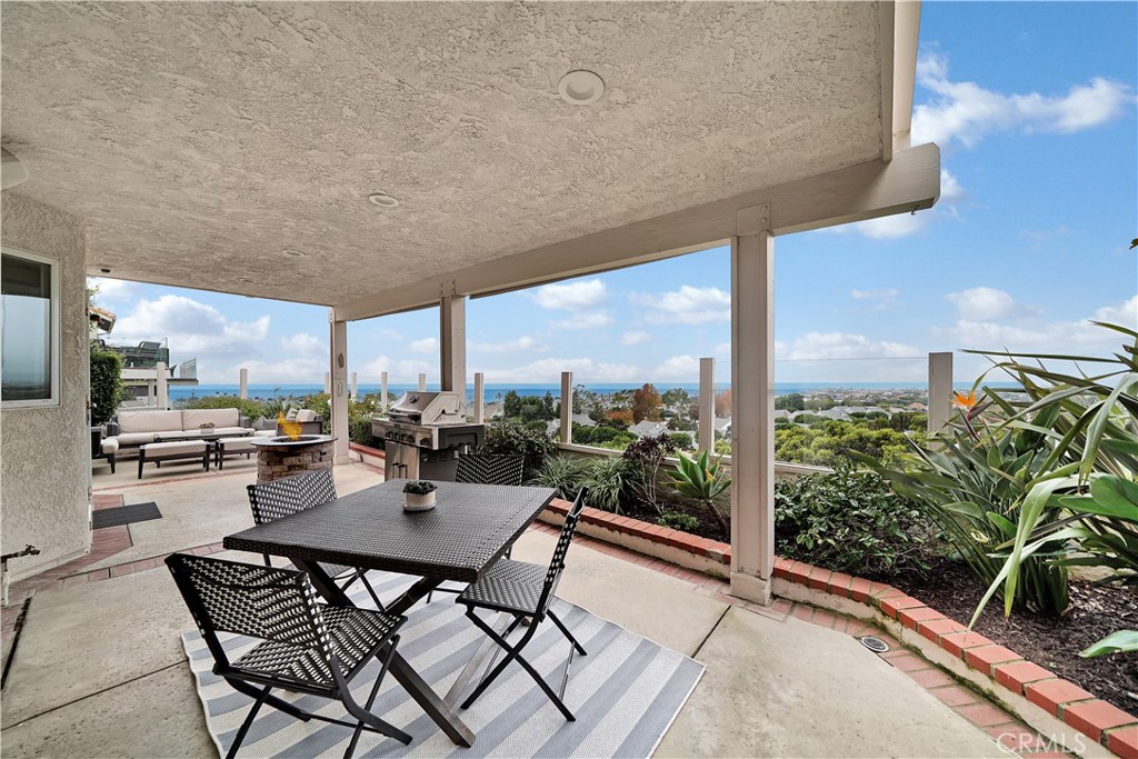 5 Regatta Way Dana Point, CA 92629 - Photo 29 of 32 a view of a patio with a table and chairs