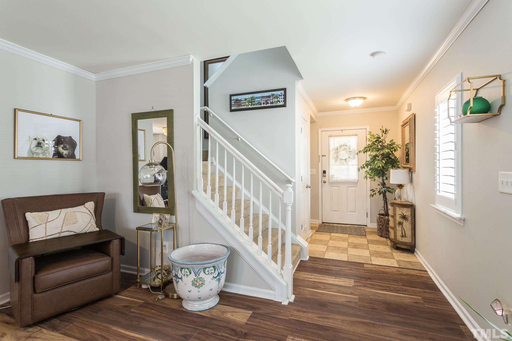 128 Ryder Cup Circle Raleigh, NC 27603 - Photo 13 of 30 a living room with furniture and a wooden floor