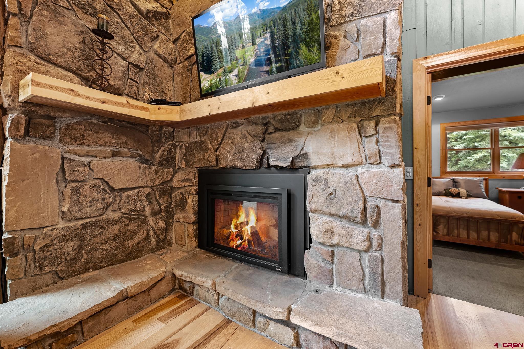 312 County Road 243 Durango, CO 81301 - Photo 14 of 33 a view of fireplace with wooden floor