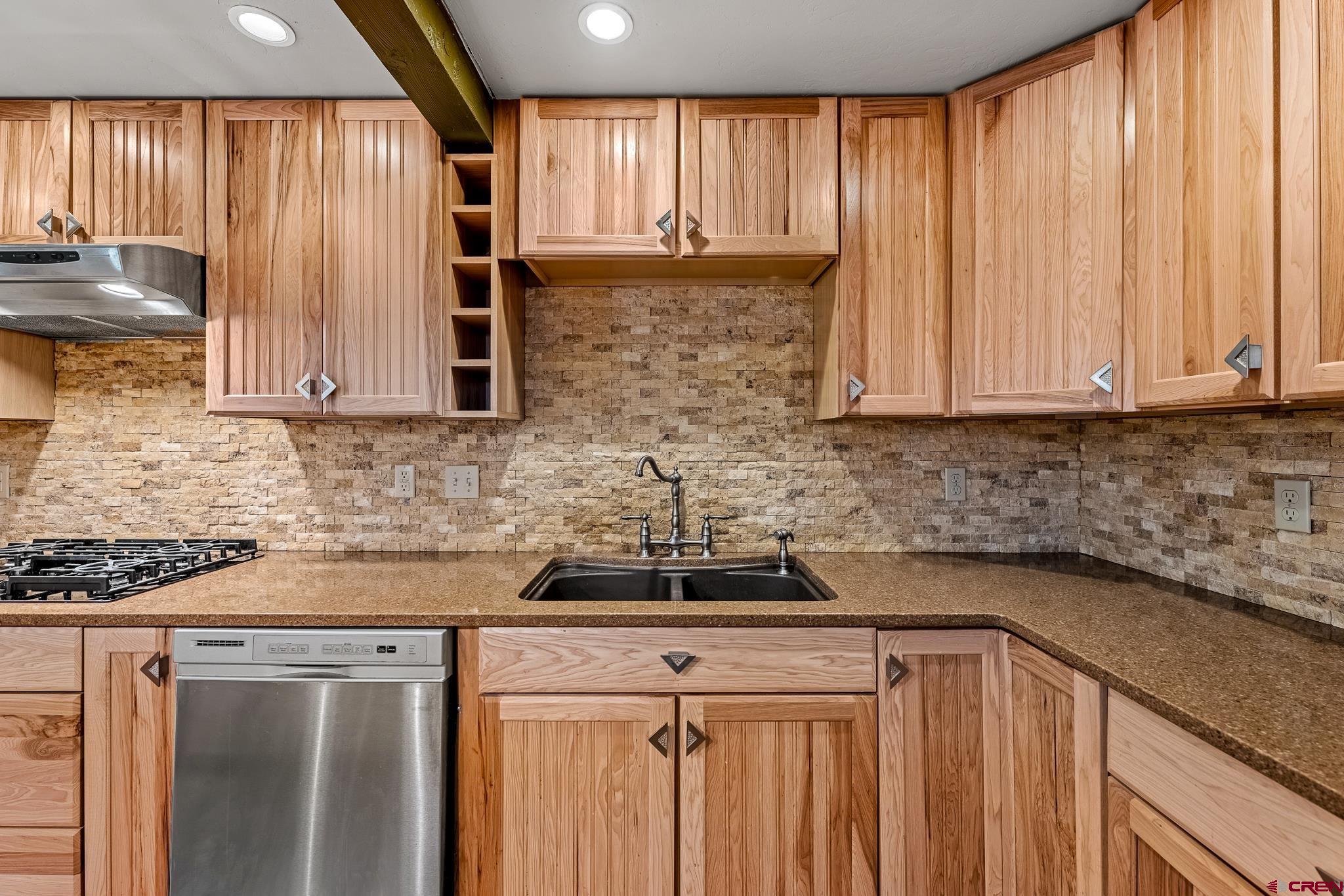 312 County Road 243 Durango, CO 81301 - Photo 17 of 33 a kitchen with a sink cabinets and window