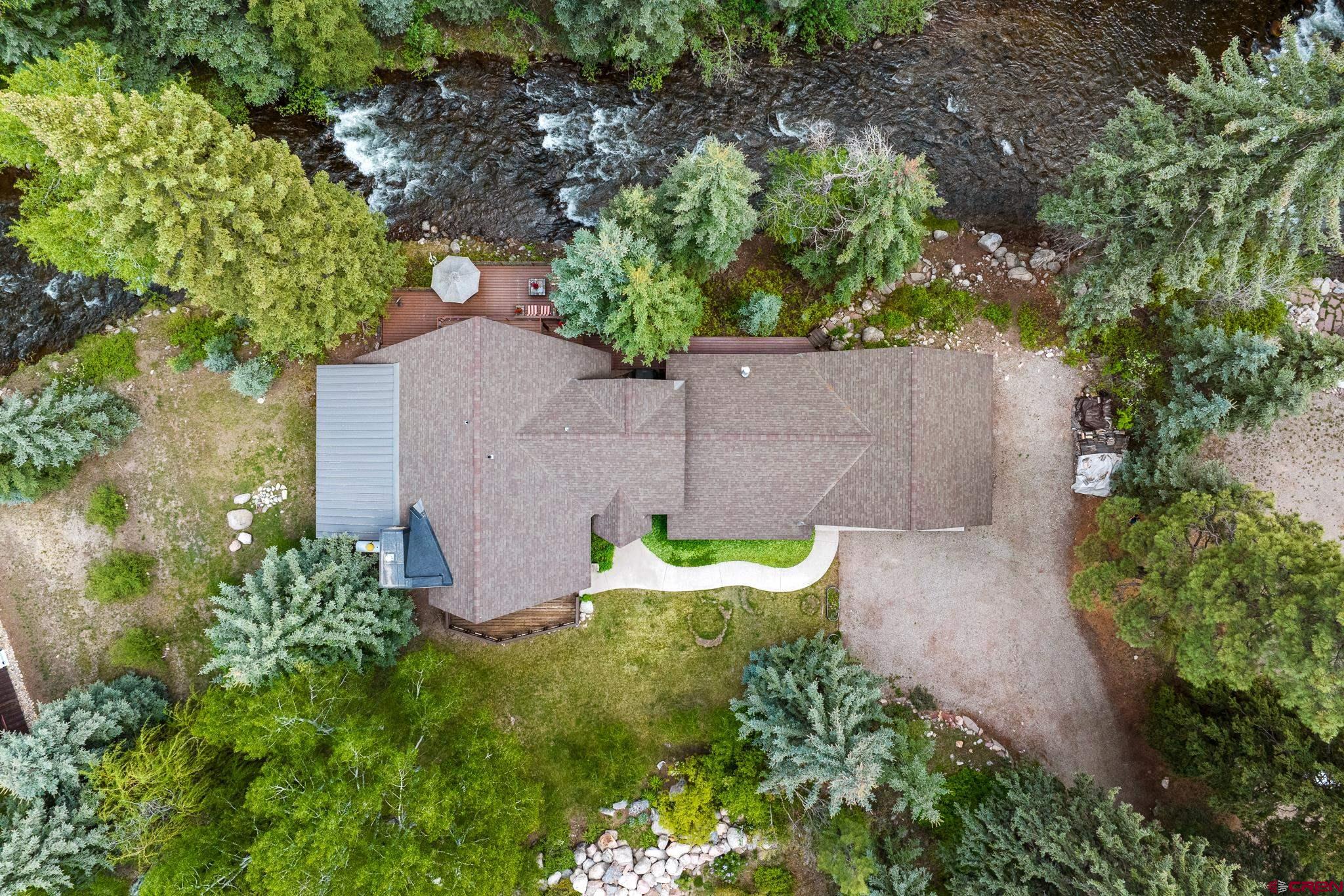312 County Road 243 Durango, CO 81301 - Photo 33 of 33 an aerial view of a house with garden space and street view