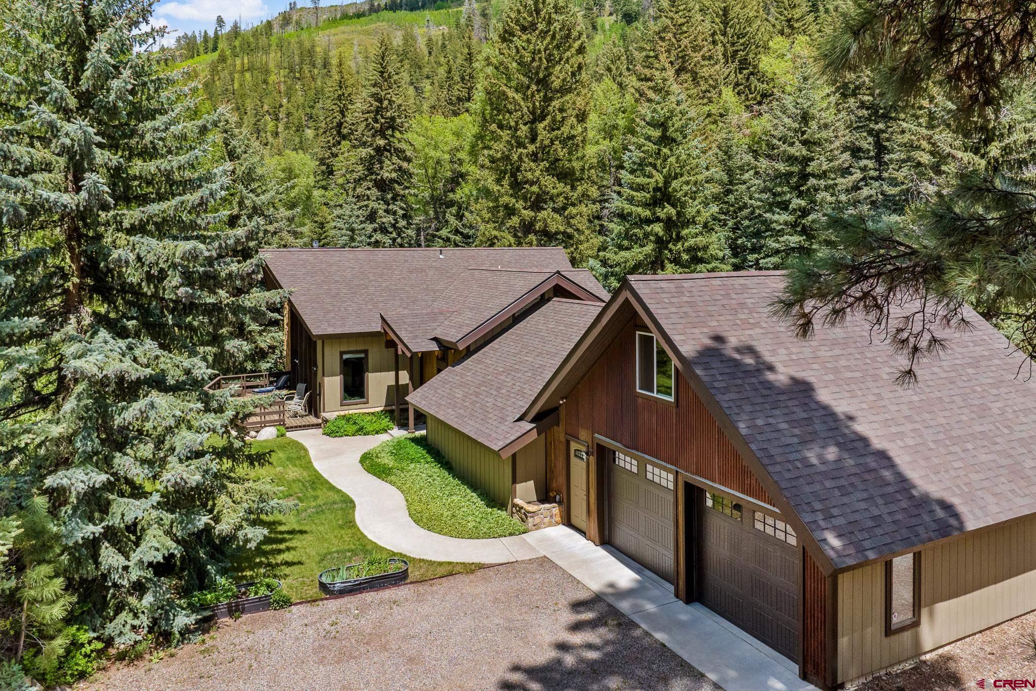 312 County Road 243 Durango, CO 81301 - Photo 5 of 33 an aerial view of a house with swimming pool and porch