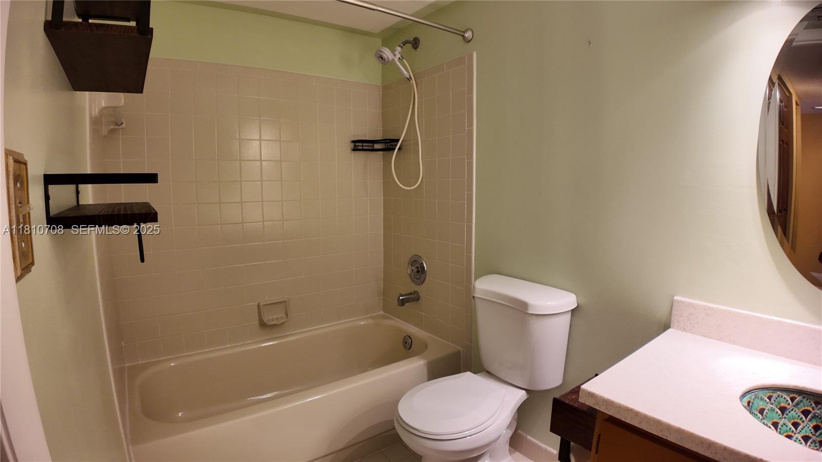 9577 West McNab Road, Unit 110 Tamarac, FL 33321 - Photo 13 of 38 Guest Bathroom.