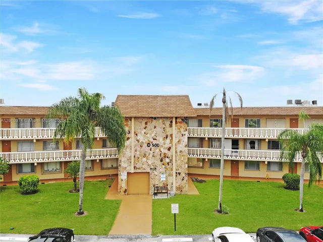 a view of building with yard