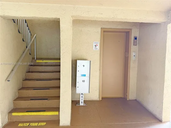 a view of an entryway with staircase