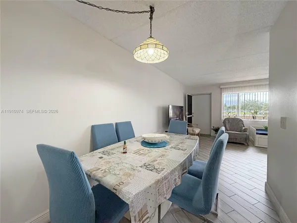 a view of a dining room with furniture