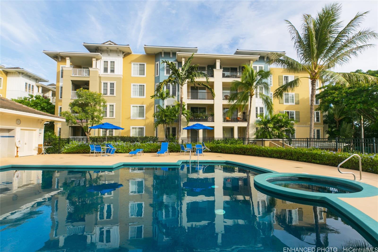 520 Lunalilo Home Road, Unit 6202 Honolulu, HI 96825 - Photo 1 of 1 a front view of a building with a yard table and chairs