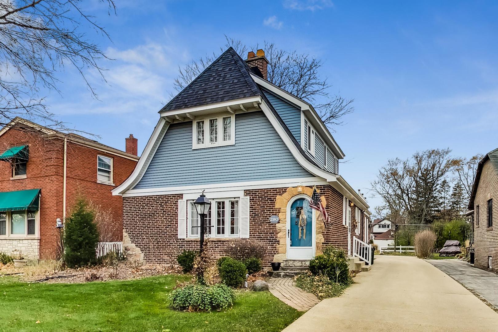 280 Nuttall Road Riverside, IL 60546 - Photo 1 of 52 a front view of a house with a yard