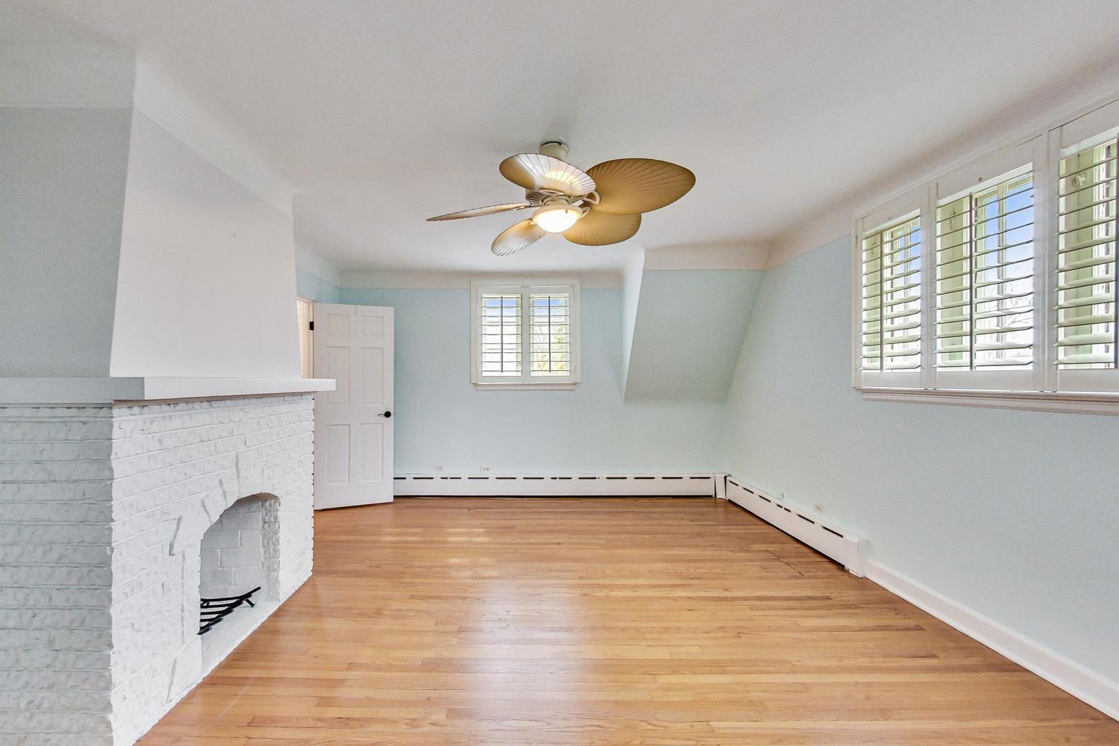280 Nuttall Road Riverside, IL 60546 - Photo 22 of 52 a view of empty room with a window and fireplace