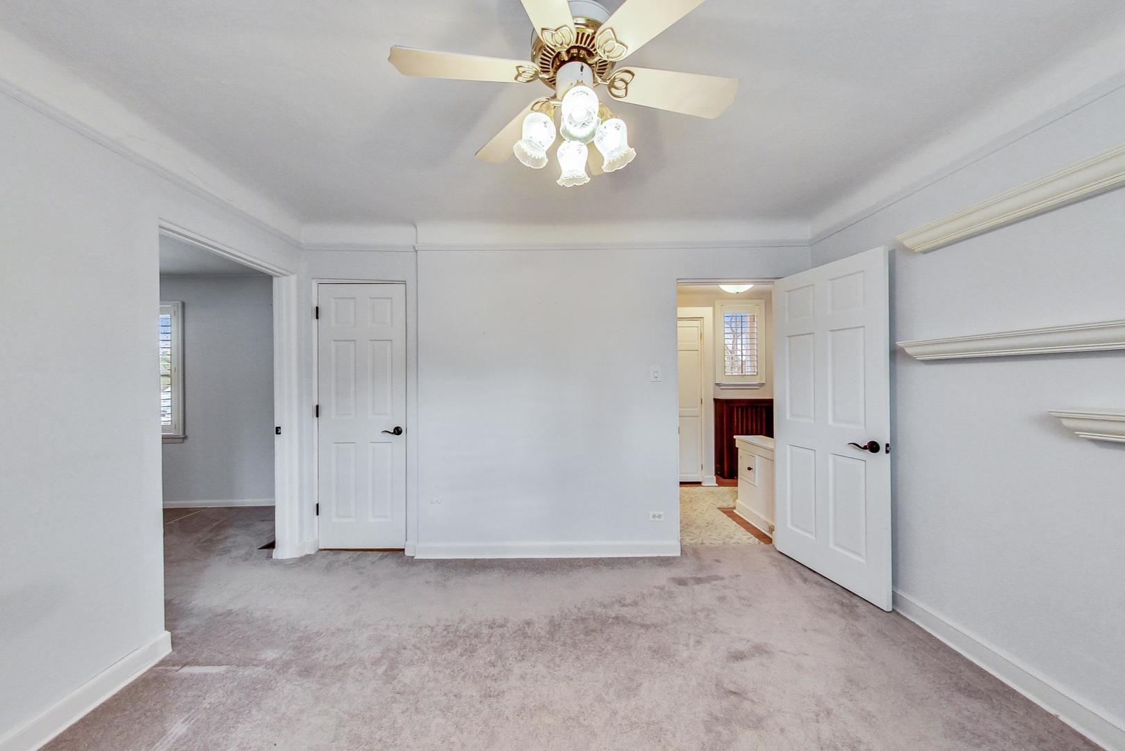 280 Nuttall Road Riverside, IL 60546 - Photo 25 of 52 a view of a chandelier in big room and chandelier fan