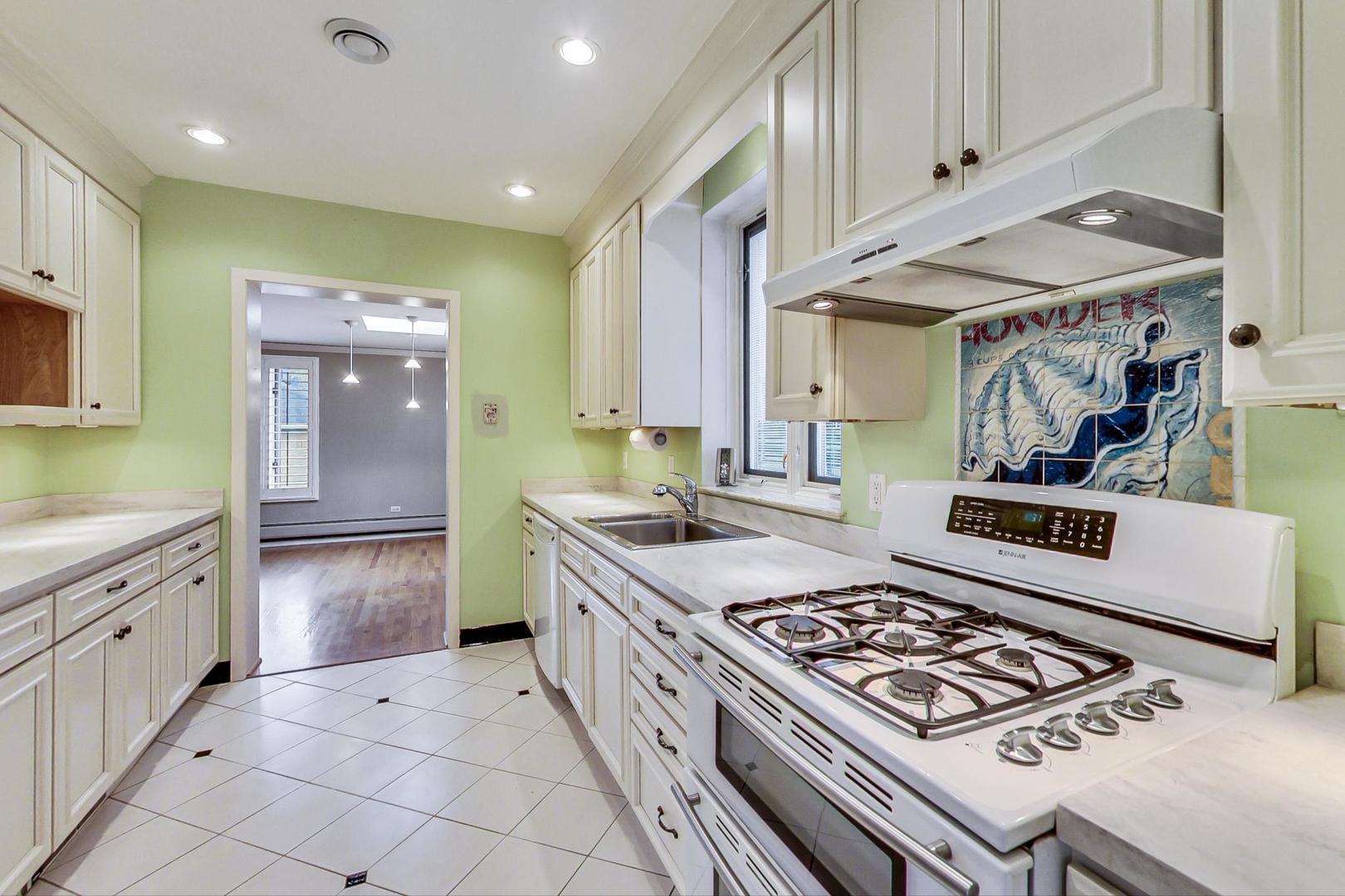 280 Nuttall Road Riverside, IL 60546 - Photo 9 of 52 a kitchen with stainless steel appliances granite countertop a stove and a sink