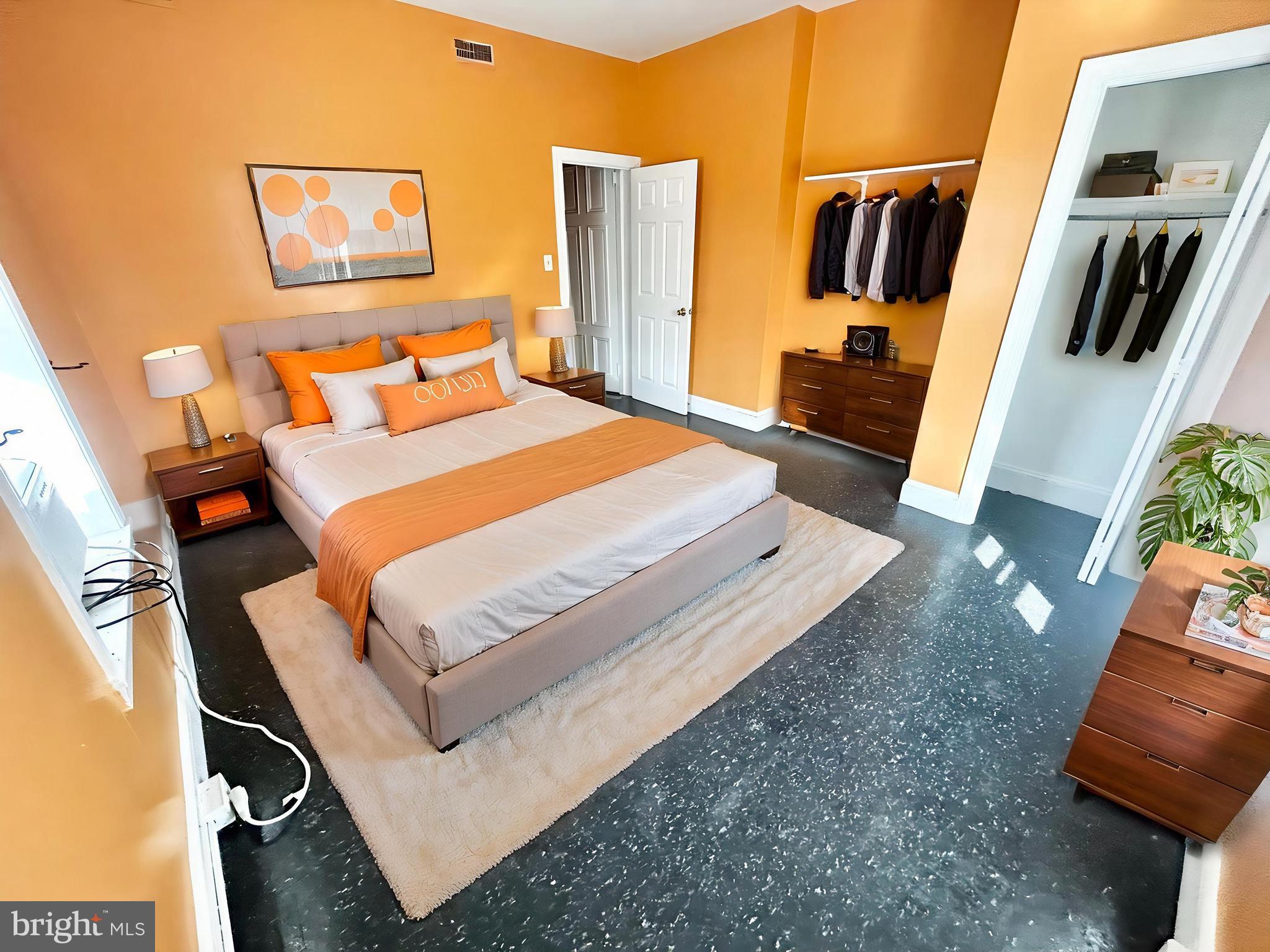 3618 Spring Garden Street, Unit 3 Philadelphia, PA 19104 - Photo 1 of 13 a bedroom with a bed and a couch