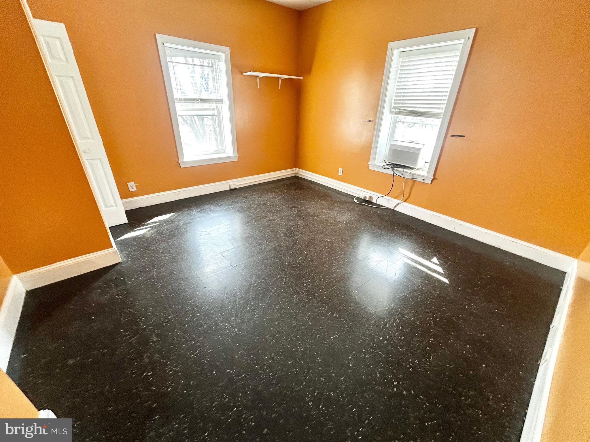 3618 Spring Garden Street, Unit 3 Philadelphia, PA 19104 - Photo 12 of 13 an empty room with windows