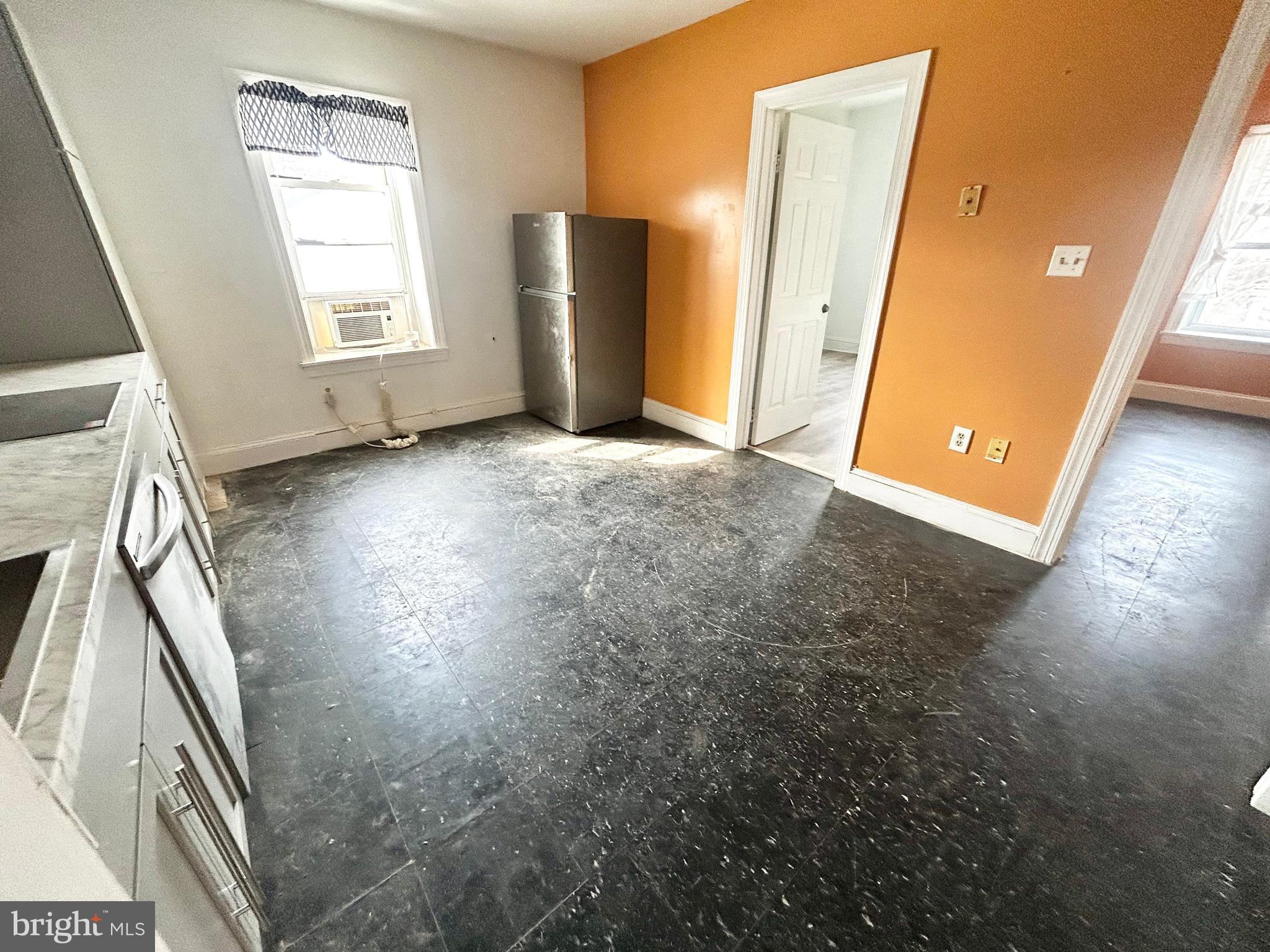 3618 Spring Garden Street, Unit 3 Philadelphia, PA 19104 - Photo 3 of 13 an empty room with windows