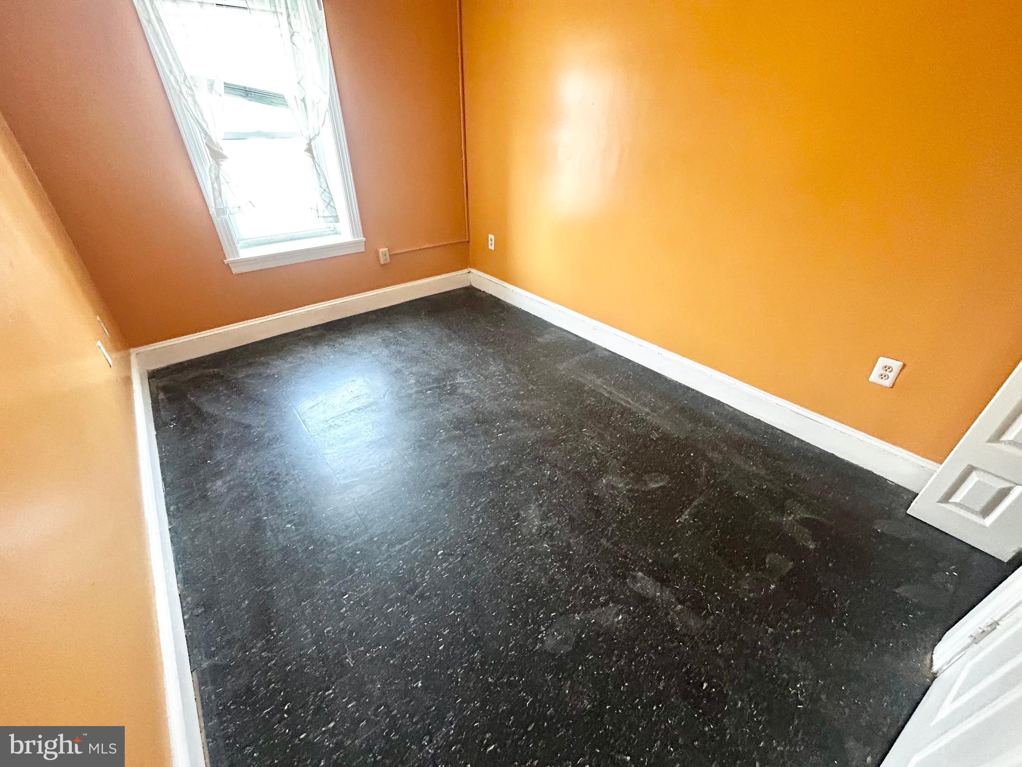 3618 Spring Garden Street, Unit 3 Philadelphia, PA 19104 - Photo 9 of 13 a view of room with window and wooden floor