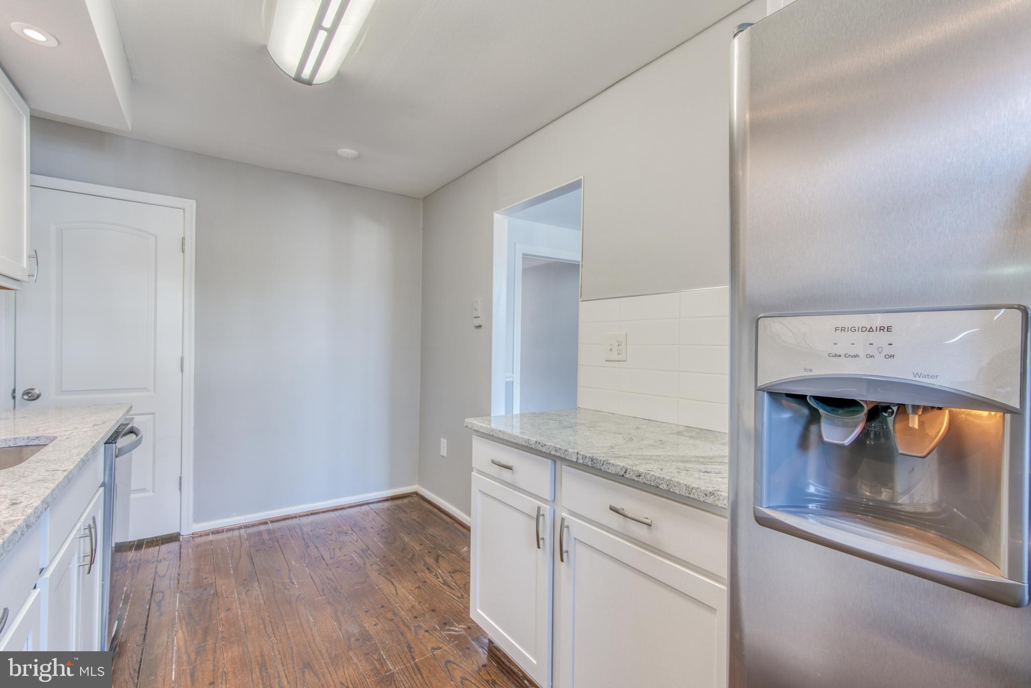 531 Grovethorn Road Baltimore, MD 21220 - Photo 19 of 56 a hallway with washer and dryer