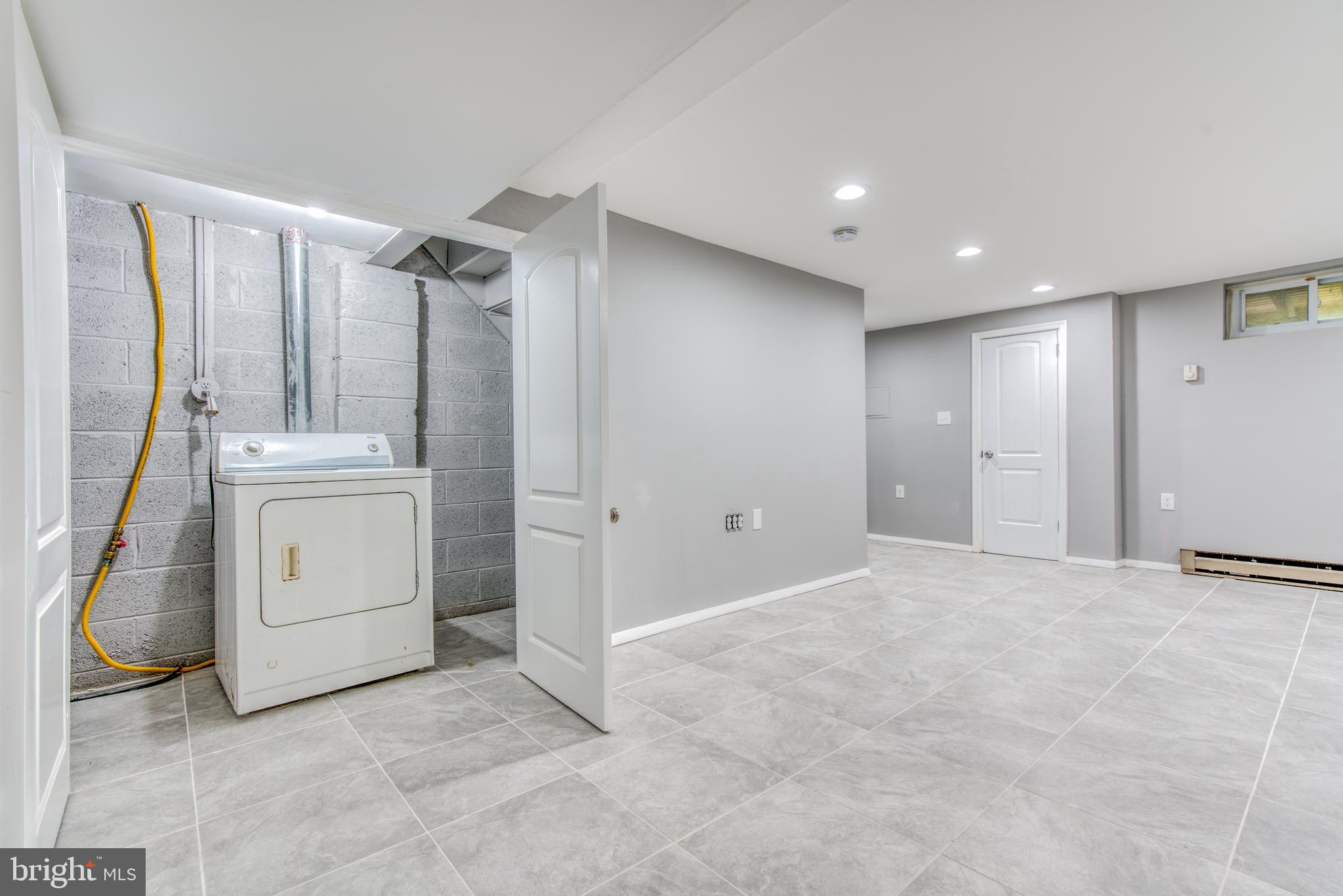 531 Grovethorn Road Baltimore, MD 21220 - Photo 24 of 56 a view of a kitchen with white cabinets