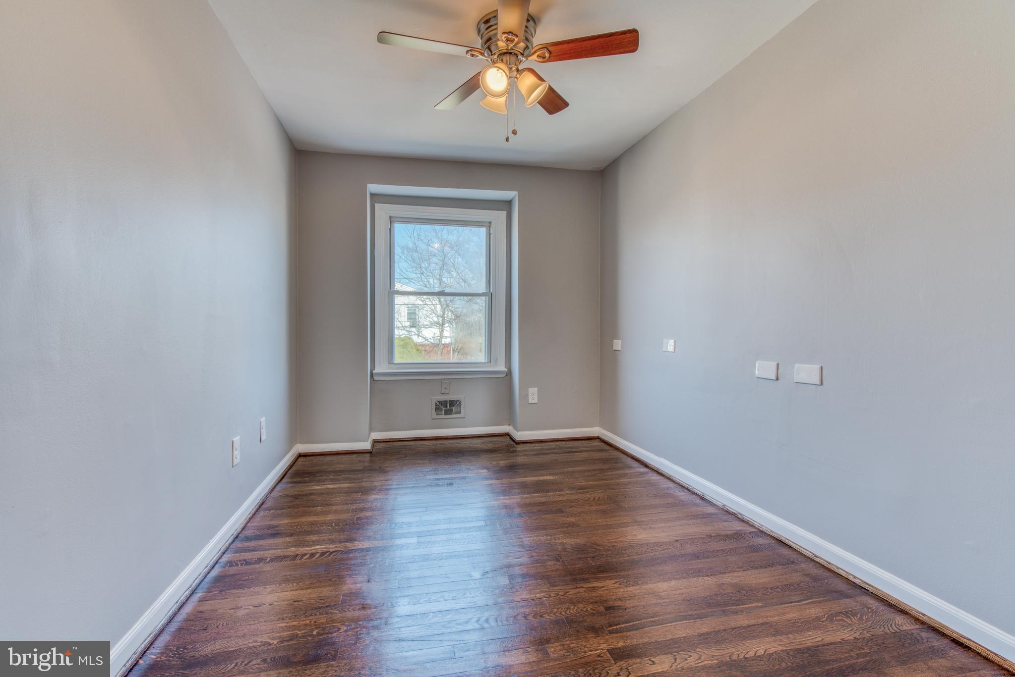 531 Grovethorn Road Baltimore, MD 21220 - Photo 33 of 56 wooden floor in an empty room with a window