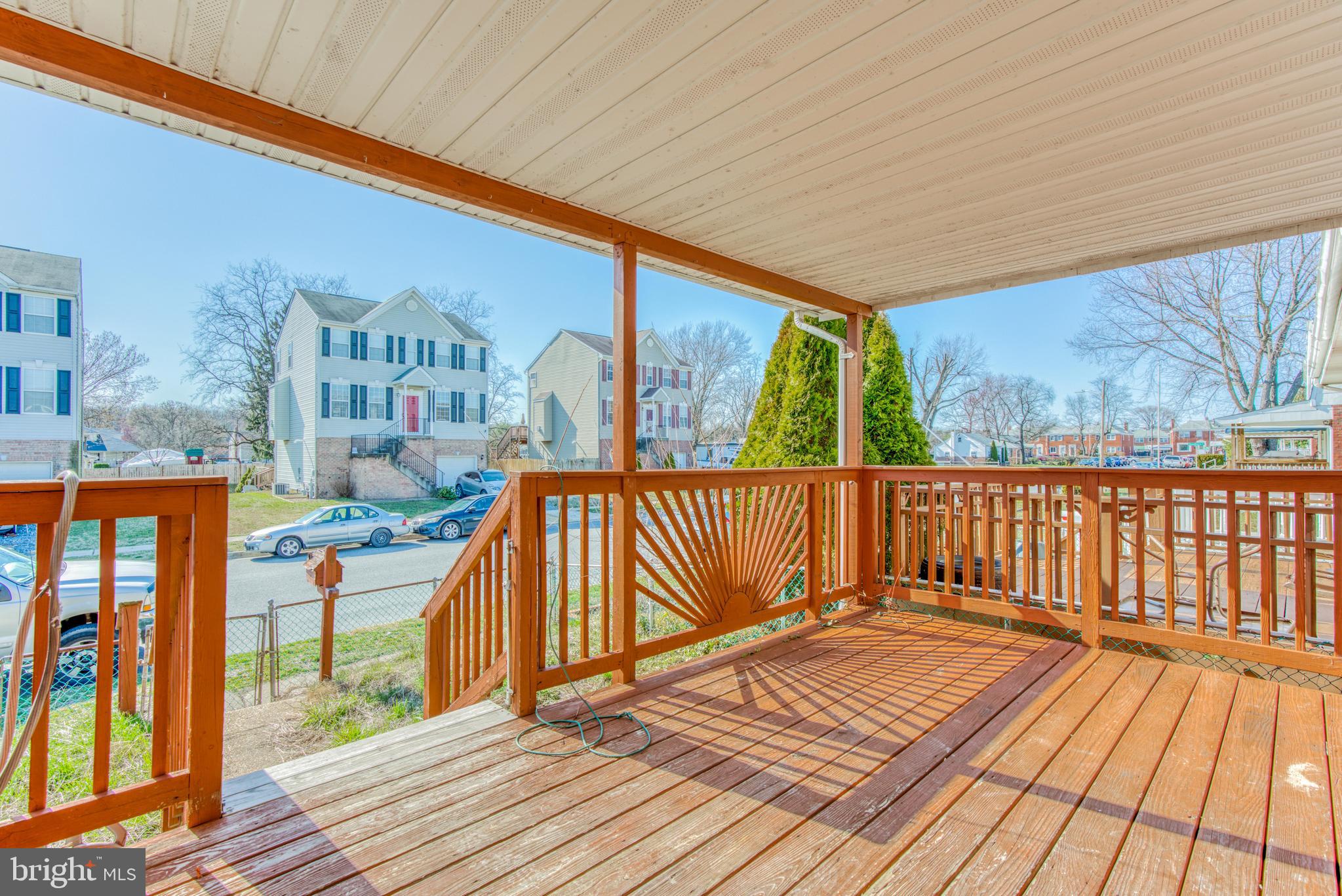 531 Grovethorn Road Baltimore, MD 21220 - Photo 52 of 56 a view of balcony with wooden floor and outdoor seating
