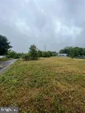 a view of a large body of water and mountain