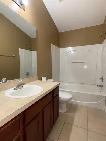 a view of room that has a bench