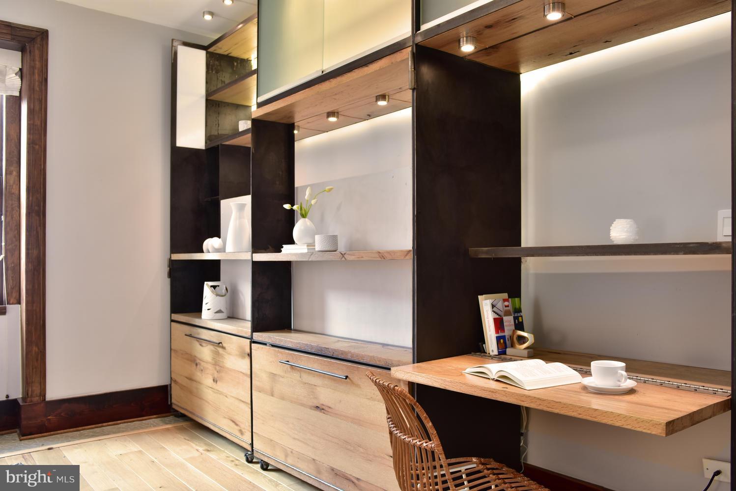 1725 17th Street Northwest, Unit 207 Washington, DC 20009 - Photo 11 of 28 a bathroom with a sink and a mirror