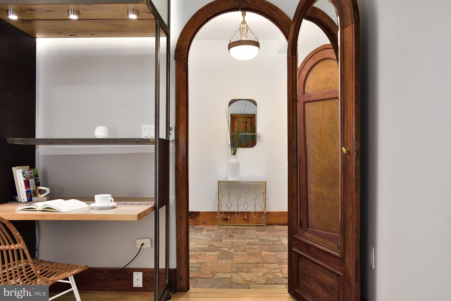 1725 17th Street Northwest, Unit 207 Washington, DC 20009 - Photo 18 of 28 a bathroom with a sink and a mirror