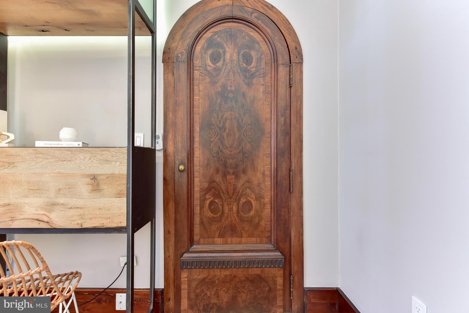 1725 17th Street Northwest, Unit 207 Washington, DC 20009 - Photo 19 of 28 an empty room with wooden floor and windows