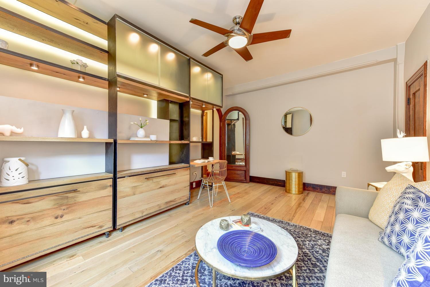 1725 17th Street Northwest, Unit 207 Washington, DC 20009 - Photo 6 of 28 a living room with furniture