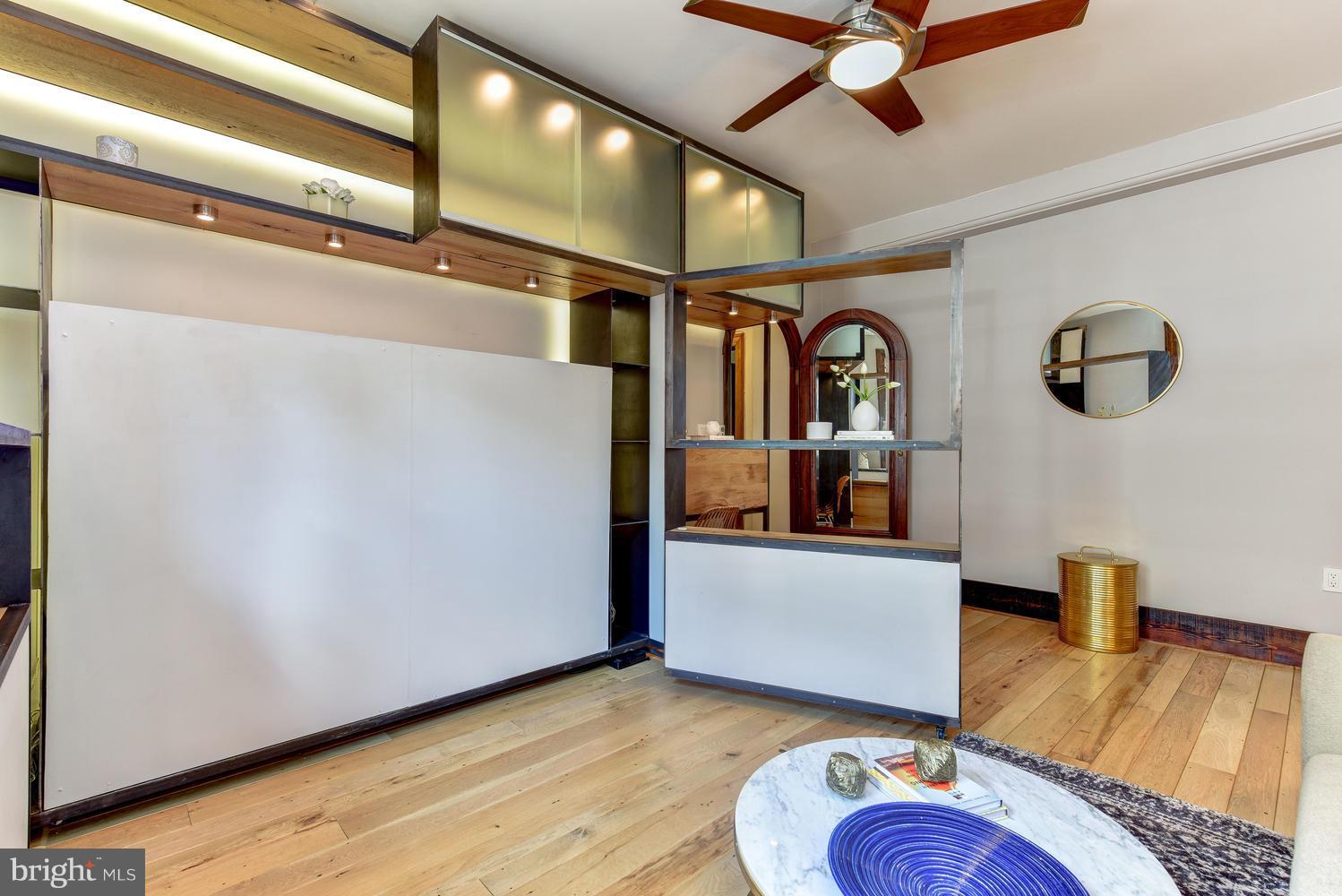 1725 17th Street Northwest, Unit 207 Washington, DC 20009 - Photo 7 of 28 a view of livingroom with furniture and wooden floor