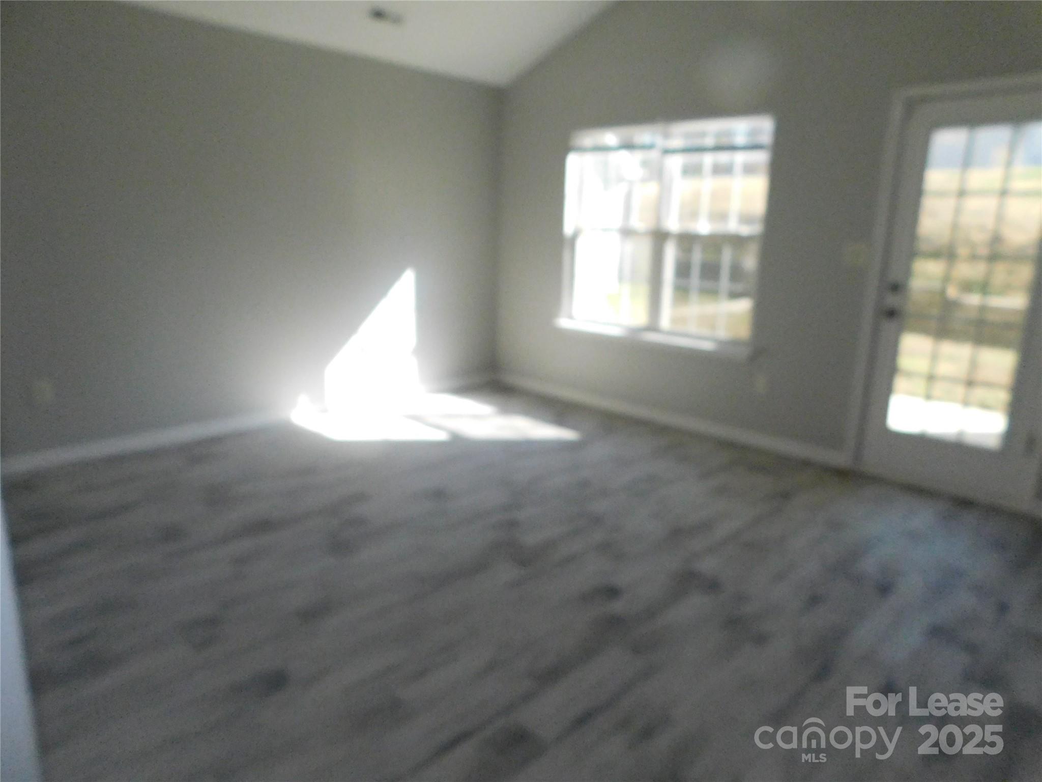 1119 Hannah Rae Court Charlotte, NC 28214 - Photo 6 of 19 an empty room with windows