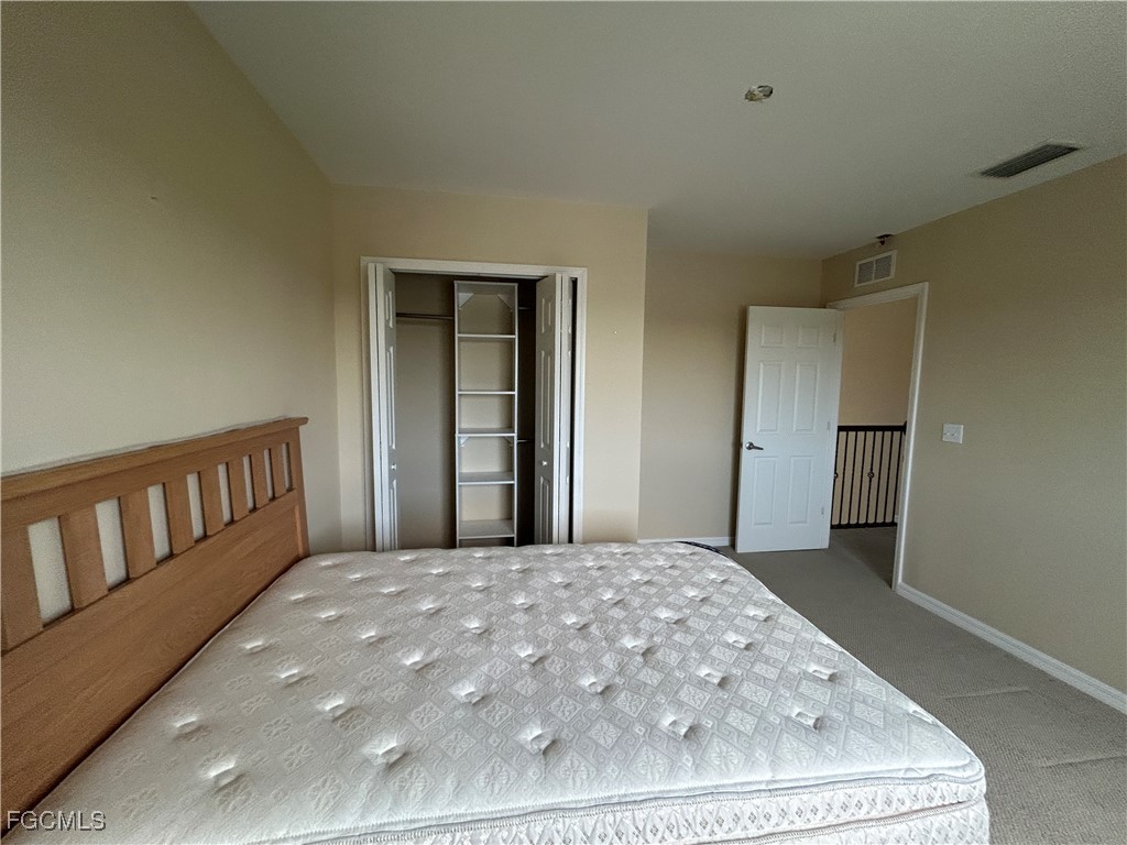 Undisclosed Address Cape Coral, FL 33991 - Photo 18 of 40 a view of a bedroom from a balcony