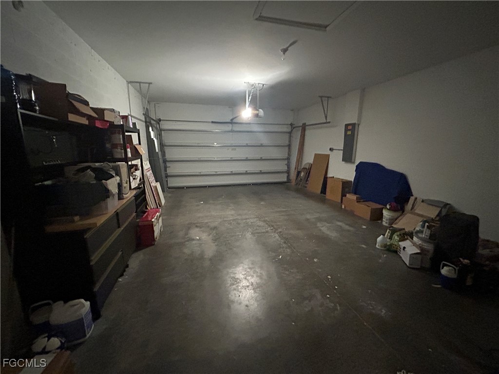 Undisclosed Address Cape Coral, FL 33991 - Photo 20 of 40 a view of walk in closet with clothes and shoes