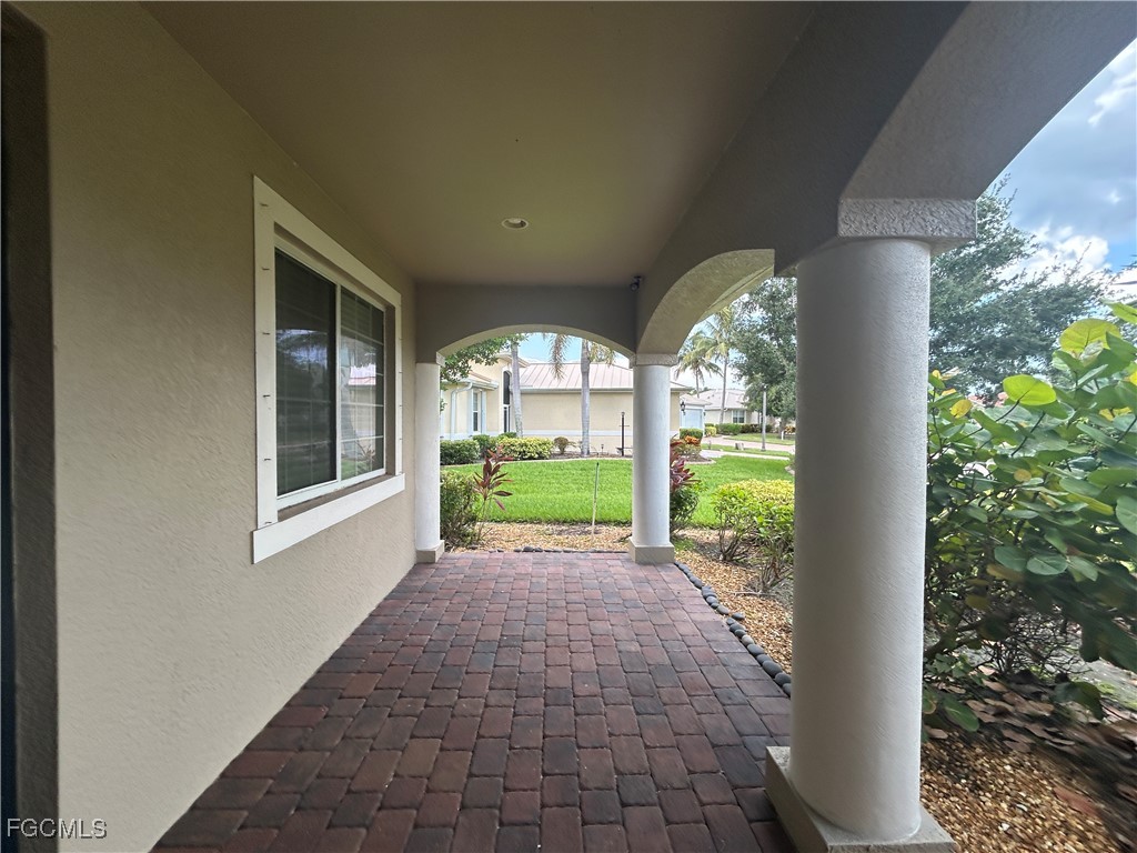 Undisclosed Address Cape Coral, FL 33991 - Photo 2 of 40 a view of porch and garden