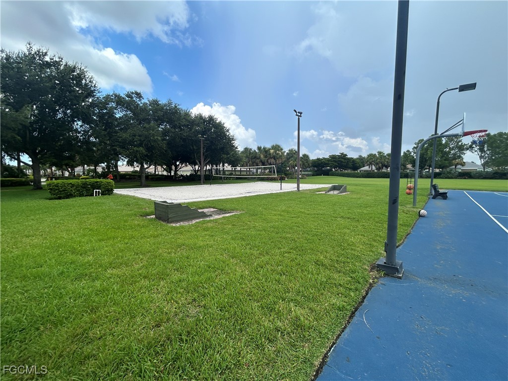 Undisclosed Address Cape Coral, FL 33991 - Photo 25 of 40 a view of a golf course with a lake