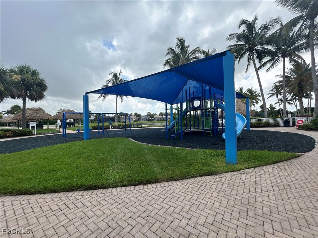 Undisclosed Address Cape Coral, FL 33991 - Photo 26 of 40 a view of a yard with palm trees