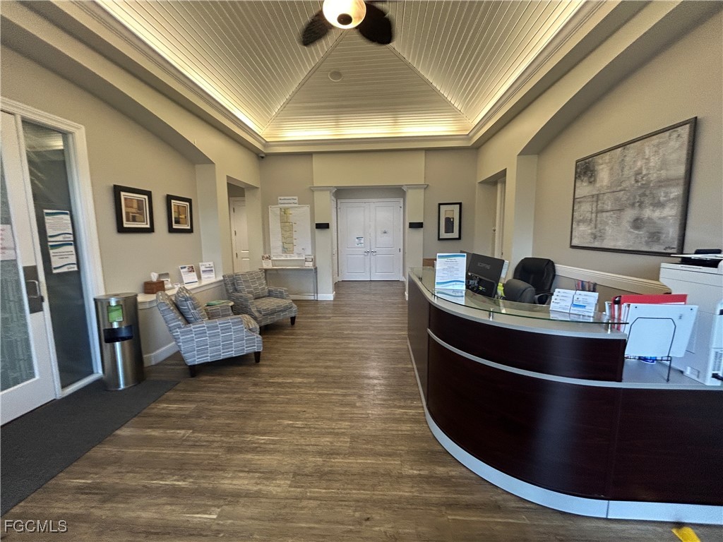 Undisclosed Address Cape Coral, FL 33991 - Photo 36 of 40 a living room with furniture and a wooden floor