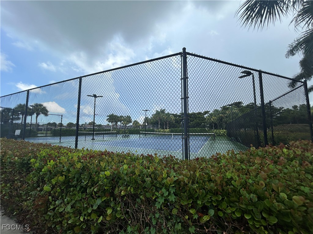 Undisclosed Address Cape Coral, FL 33991 - Photo 39 of 40 a view of a lake from a balcony